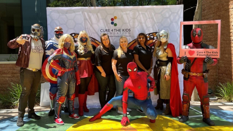 Group shot with people dressed as superheroes